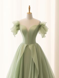 Green Organza Dress With Sweetheart Neckline, Green A-line Wedding Dress, Green Organza Dress With Fitted Bodice, Green Short Sleeve Dress For Wedding, Green Fitted Bodice Organza Dress, Green A-line Evening Dress With Fitted Bodice, Green Short Sleeve Evening Dress For Banquet, Green Tulle Dress With Short Sleeves, Green A-line Mini Dress For Wedding