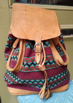 "Welcome! Amazing Vintage Leather and fabric Backpack In very good condition, i think never use A lot of pockets Measures: H: 14.56\" (37 cm) W: 13.77\" (35 cm) Deep: 3.54\" (9 cm) Thanks for stopping by!!IMPORTANT: Due to the delicate situation We're all going through, and in order to keep the safety of courier workers too, all orders will be dispatched when alert sanitary finished. You can purchased or reserve items like always. Thanks so much for your understanding." Casual Travel Satchel With Leather Backing, Casual Leather-backed Satchel For Travel, Vintage Travel Backpack With Leather Handles, Leather Trim Satchel Backpack For Daily Use, Leather-handled Satchel Backpack For Travel, Vintage Backpack With Leather Trim, Travel Backpack With Leather Handles And Satchel Shape, Vintage Backpack For Travel, Vintage Satchel With Leather Handles In Backpack Style