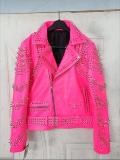 <Strong>Jacket+Description</Strong><br/> <Ol> <li><strong>Material:</strong>+Studded+Jacket+made+with+100+%+Genuine+Top+Quality+Cowhide+Leather</li><br/> <li>Polyester+Inner+Lining+&+inside+Pocket</li><br/> <li>High+Quality+Spikes+&+Studs.+Each+securely+added+by+hand</li><br/> <li>Cropped,+V... Studded Long Sleeve Biker Jacket For Spring, Fitted Studded Biker Jacket For Spring, Spring Biker Jacket With Studs, Studded Long Sleeve Biker Outerwear, Spring Studs Biker Jacket, Spring Party Biker Jacket With Rivets, Studded Long Sleeve Leather Jacket For Spring, Spring Punk Biker Jacket With Rivets, Spring Punk Biker Jacket For Alternative Fashion