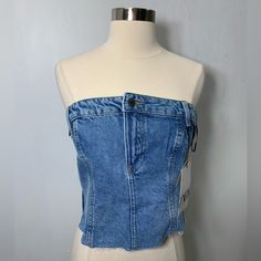 Zara The Jean Top Blue Denim Strapless Top With Zipper Closure On The Side Size Small Armpit To Armpit 16.5 Inch New With Tag #Corsettop #Y2k Style #Festival #Streetstyle #Fashion Spring Strapless Denim Crop Top, Strapless Denim Crop Top For Spring, Blue Denim Sleeveless Tube Top, Denim Blue Strapless Crop Top For Spring, Fitted Denim Top With Zipper Closure, Trendy Blue Strapless Denim Top, Strapless Denim Blue Crop Top For Spring, Blue Denim Tube Top, Denim Blue Denim Tube Top