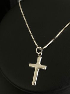 "Classic Cross Necklace, Sterling Silver Cross Pendant NECKLACE FEATURES: Metal: All components are made from solid .925 Sterling Silver Model is wearing 16\" in length solid .925 Sterling Silver Chain Length available: 16\", 18\" or 20\" MEASUREMENT: Sterling Silver Cross Pendant Height: 28 mm (1.1 inches) Width: 14 mm (0.55 inch) Your Sterling Silver Cross Necklace will arrive in a gift box, beautifully wrapped and ready for gifting Please send me a message if you have any questions before or Jewelry Cross, Beaded Ankle Bracelets, Silver Model, Pendant Minimalist, Faith Necklace, Sterling Silver Cross Necklace, Fire Opal Necklace, Sterling Silver Cross Pendant, Silver Cross Pendant