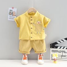 Toddler Boy Pocket T-shirt & Striped Shorts Wholesale Children's Clothing - PrettyKid Newborn Baby Clothes Set, Striped Shorts Outfit, Summer Newborn, Cheap Baby Clothes, Newborn Baby Clothes, Cartoon Shirts, Korean Casual, Baby Outfits Newborn, Short Suit