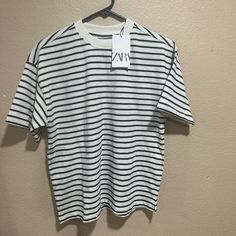 Striped Zara Shirt Fake Zara Tshirt Story, Trendy White Zara T-shirt, Zara White T-shirt For Streetwear, Basic White Zara T-shirt, Zara Casual T-shirt For Spring, Zara Striped Crew Neck Top, Trendy Striped Zara Tops, Zara T-shirt For Spring Streetwear, Trendy White Zara Shirt