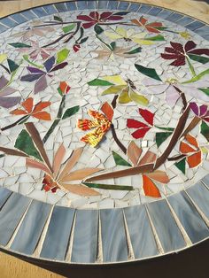 MOSAIC TABLE colorful dancing flowers stained by ParadiseMosaics Flowers Stained Glass, Stained Glass Mosaic Art, Mosaic Tables, Mosaic Table Top, Mosaic Art Projects, Floral Mosaic, Mosaic Murals, Glass Mosaic Art, Custom Stained Glass