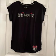 Black T With Minnie And Minnie Mouse Appliqu In Black N White Gingham With Red Bow New With Tag Black Minnie Mouse Crew Neck Top, Black Casual Minnie Mouse Top, Casual Black Minnie Mouse Top, Black Minnie Mouse T-shirt Short Sleeve, Black Minnie Mouse Short Sleeve T-shirt, Black T-shirt With Minnie Mouse Graphic, Crew Neck, Disney Boutique, Halloween Scrubs, Holiday Graphic Tees