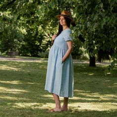 📏 FIT Maria dress has a relaxed and roomy fit, is true to size, and designed with a higher waistline to accentuate a pregnant belly. We suggest taking your usual size in this style to achieve the look as shown in pictures. Please note, the garment naturally softens and relaxes as you wear it throughout the day. It'll become more comfortable as you move around in it. Before placing an order, always check the approximate measurements of the finished garment given among the pictures. If you have d Maternity Dresses For Baby Shower, Baby Shower Dress, Maternity Dresses Summer, Dress With Buttons, Summer Linen Dresses, Baby Shower Dresses, Linen Midi Dress, Shower Dresses, Spring Boho