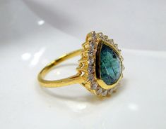 Emerald Ring, vintage18 K solid gold hallmarked, Natural emerald Diamond gemstone ring. Beautiful collection piece in very good condition. USA ring size -7.5 ( we can adjust size), size of top-16.5/15.5 mm, emerald weight-4 carat, diamond weight-0.63 carat VS G. Gold Teardrop Emerald Ring, Pear-shaped Gold Emerald Ring, Gold Emerald Pear-shaped Ring, Gold Pear-shaped Emerald Ring, Gold Emerald Pear-shaped Ring For Anniversary, Emerald Ring Vintage Antique, Diamond Emerald Ring, 22k Gold Bangles, Smaragd Ring