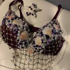 a bra that has beads and pearls on it