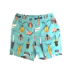 Organic cotton play shorts in Beetle Mania print from Jackalo Playful Cotton Swim Trunks For Summer, Fun Cotton Beach Shorts, Fun Beach Cotton Shorts, Playful Green Shorts For Vacation, Playful Cotton Swim Trunks With Built-in Shorts, Playful Shorts For Playtime, Playful Green Vacation Shorts, Fun Green Summer Shorts, Playful Cotton Shorts For Vacation