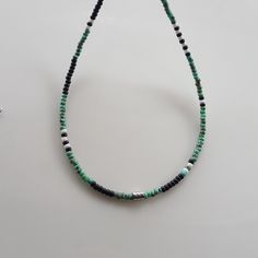 Elevate your summer bohemian style with this unique Mens Beaded Necklace! This Boho-inspired piece is perfect for adding a touch of flair to any outfit. Handcrafted with high-quality beads, this versatile Mens Necklace can also be styled as a beaded choker for a trendy look. Whether you're shopping for yourself or looking for beaded necklaces for women gifts, this necklace is sure to make a statement. Upgrade your accessory game with this one-of-a-kind beaded necklace today! Miyuki round 8/0 Pic Bohemian Necklace With Spacer Beads For Beach, Bohemian Beach Necklace With Spacer Beads, Bohemian Black Beaded Necklaces For Summer, Bohemian Beaded Bracelets With Black Beads For Beach, Bohemian Turquoise Beaded Bracelets With Black Beads, Bohemian Turquoise Beaded Bracelet With Black Beads, Bohemian Black Beaded Bracelets For Beach, Turquoise And Black Beaded Bohemian Bracelet, Bohemian Summer Necklace With Black Beads