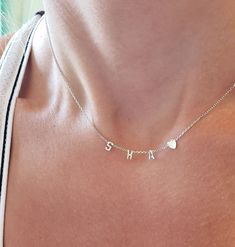 "Initial necklace with a tiny heart symbol of love and unity! Dainty 14k Initial pendant necklace is made with a cable chain and available with all letters and three colors. You can also request a single initial and a heart as a mother's day gift. Two initials for a couples. Three and mre initials for a big Family. ♥Quick tip: If you are size XS,S, go for 14'' -15'' chain. If you are (S-M), M ,L go with 16''-18\".♥ Initial letter pendant is a good gift for: Mother's day. Birthday. Anniversary. C Alphabet Necklace, Special Necklace, Family Necklace, Heart Symbol, Initial Pendant Necklace, Necklace Heart, Necklace Minimalist, Tiny Heart, Letter Pendants