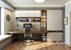 a home office with wooden floors and white cabinets