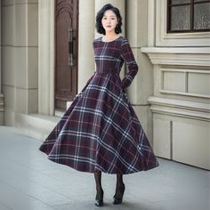 Plaid is a vintage classic choice, and it's perfect for autumn and winter to wear this warm plaid skirt of ours, and the waisted, flared shape is also very slimming. DETAIL * 30% wool, 30% fiber, 40% polyester * fully satiny lining, more nice to the touch body * Round neckline * Long sleeves dress * Two side seam pockets * Back zipper closure * Fit and flare dress * Midi wool dress * Plaid wool dress, Retro wool dress MODEL SIZE Bust 85 cm(33.4")  Waist 67 cm(26.7")  Height 168cm (5' 6") She wea Fitted A-line Vintage Dress For Winter, Retro A-line Vintage Dress For Fall, Vintage Plaid Dress For Winter, Classic A-line Winter Dress, Vintage Plaid Winter Dress, Vintage A-line Midi Dress For Fall, Fitted Vintage A-line Dress For Winter, Vintage Plaid Dress For Fall, Fitted Retro Plaid Dress For Fall