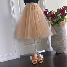 This Midi Beige Tulle Skirt Is Extra Puffy For Special Occasions. It’s Triple Layered And Has An Elastic Waistband For More Comfort. Last One Available! Size Small (Fits Sizes 2-8us) Chic Tulle Petticoat, Chic Skirt-style Petticoat For Parties, Chic Petticoat Skirt For Party, Chic Party Petticoat Skirt, Chic Spring Party Petticoat, Chic Party Petticoat For Spring, Chic Party Petticoat, Beige Tiered Tulle Skirt, Beige Tiered Skirt For Party