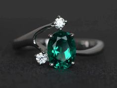 Welcome to my shop, you can find many beautiful gemstone jewelry here, and you also can ask for customized service. Main Stone: lab emerald, oval cut, measures 6X8 mm, weight 1.12 caratsAccent Stones: czMetal: 925 sterling silver plated with rhodium so as to protect the ring from tarnish and keep it shinning. I also can provide metal options such as 14k solid yellow/white/rose goldSetting: prong setting more rings: https://www.etsy.com/shop/XCjewelryStudio?ref=hdr_shop_menuIt's quite comfortable Green Three Stone Emerald Promise Ring, Green Emerald Three-stone Birthstone Ring, Silver Three-stone Emerald Ring, Silver Three Stone Emerald Ring, Silver Emerald Ring With Three Stones, Three Stone Silver Emerald Ring, Silver Emerald Ring With Three Stones For Promise, Silver Three Stone Emerald Ring For Promise, Green Sterling Silver Three-stone Birthstone Ring