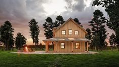 a small wooden house sitting on top of a lush green field under a cloudy sky