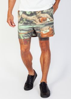 Stride in style and comfort with the men's Everlast x Coney Watercolor Nylon Shorts. Boasting a drawstring waistline for personalized comfort and side pockets for added convenience, these shorts fuse fashion with functionality. Featuring a standard fit and screen-printed graphics, they exude urban flair while offering practicality. The iconic Everlast logo at the hem adds a signature touch to complete the look, making them a must-have addition to your wardrobe. - *NOT ELIGIBLE FOR DISCOUNT OR PROMOTION- Model is 5'9 wearing a size medium Screen printed graphics 5.5" inseam Pockets on both sides Drawstring Return Policy Shipping Policy Green Sporty Swim Trunks With Drawstring, Sporty Nylon Khaki Shorts, Green Outdoor Bottoms With Functional Drawstring, Green Bottoms With Functional Drawstring For Outdoor, Sporty Khaki Nylon Shorts, Green Nylon Swim Trunks For Outdoor, Outdoor Green Nylon Swim Trunks, Green Nylon Bottoms With Functional Drawstring, Green Drawstring Swim Trunks