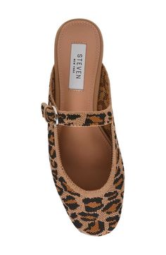 An adjustable mary jane strap and knit upper add contemporary appeal to a versatile mule that will complement your polished looks. Adjustable strap with buckle closure Textile upper/synthetic lining/rubber sole Imported Shoes 2025 Trends, Leopard Mules, Polished Look, Street Styles, Cheetah Print, Shoe Shop, Cute Shoes, Comfortable Shoes, Fashion Ideas