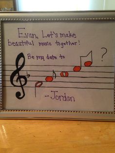 a framed musical note with the words, even let's make beautiful music together be my date to jordan