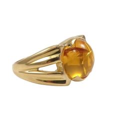 Solid 18k Yellow Gold Natural Yellow Citrine Cabochon Ring Size 7.75 U.S. Ring Size - 7.75 Ring Face Length X Width In Mm - 12 X 21 Gram Weight - 7.3 Main Stone - Citrine Main Stone Length X Width In Mm - 10 X 10 Total Carat Weight -3.87 Inventory Code - Gjc-20-Ee97-Ms190-A327d Hallmarked - Yes Tested - Yes Notes - Professionally Cleaned, Polished, And Tested. There Are Natural Feathers In The Stone, It Is Not Cracked Please Contact Us With Any Questions. We Love To Hear From Shoppers. Thank You For Your Interest. Modern Yellow Gold Cabochon Rings, Modernist Formal Cabochon Rings, Yellow Gold Citrine Rings With Polished Finish, Yellow Gold Oval Cabochon Rings For Formal Occasions, Formal Yellow Gold Oval Cabochon Rings, Modern Yellow Gold Dome Ring With Cabochon, Classic Amber Rings For Formal Occasions, Elegant Yellow Cabochon Rings, Classic Yellow Gold Cabochon Dome Ring