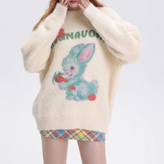 This unique, statement sweater features a captivating cartoon love bunny, adding a touch of personality to your wardrobe. Crafted from soft, yet durable fabric for ultimate comfort and style, this classic sweater is a must-have for any fashion enthusiast. Features: -30% acrylic, 70% nylon -Crew Neckline -Love -Letter -Bunny -Dropped Shoulder -Regular fit -Cute style Cute Acrylic Crew Neck Sweater, Oversized Kawaii Long Sleeve Sweater, Trendy Long Sleeve Cartoon Print Sweater, Trendy Long Sleeve Sweater With Cartoon Print, Kawaii Winter Sweater With Cartoon Print, Playful Cartoon Print Sweater For Fall, Kawaii Knit Sweater For Fall, Winter Cartoon Print Long Sleeve Sweater, Playful Long Sleeve Graphic Sweater