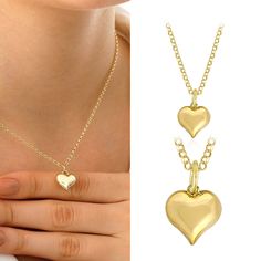 "This 14k Gold Dainty Necklace with Heart Pendant symbolizes the eternal power of love and craftsmanship. This necklace is handcrafted with care and boasts a traditional rolo chain that complements the trendy yet classic puffy heart charm. The heart, a global symbol of love and affection, delicately dangles from the chain, reminding you of the love that links you to those who are most important to you. It's more than simply jewelry; it's a message, a proclamation of love, and a treasured keepsak Heart Charm Necklace For Gifts, Heart Shaped Fine Jewelry Necklace For Anniversary, Yellow Gold Heart Necklace Gift For Her, Yellow Gold Heart Necklace For Her, Fine Jewelry Heart Pendant Charm Necklace For Valentine's Day, Heart Beads Double Heart Jewelry Gift For Her, Yellow Gold Heart Necklace As Gift For Her, Double Heart Beaded Necklaces As Gift For Her, Heart Beads Jewelry Gift For Her