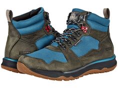 Kodiak Skogan Take A Hike Mid - Men's Boots : Grey/Teal : With plenty of cushioning and contoured footbeds, you'll feel the impact of the Kodiak Skogan Take A Hike Mid hiking boot in every step. Style: 0A4TFBB47 (Gold/Blue), 0A4TFBB63 (Grey/Teal). Traditional lace-up closure for a secure fit. Premium full grain waterproof leather and sealed seams. Breathable, waterproof membrane construction. Classic D-ring and quick-hook rust-resistant hardware. KODIAK Comfortzone ECO footbed. Lightweight, comp Rugged Outdoor Walking Shoes With Ortholite Insole, Gore-tex Lace-up Hiking Boots With Cushioned Footbed, Impact Resistant Walking Shoes With Round Toe For Hiking, Sporty Impact-resistant Boots For Adventure, Sporty Cushioned Walking Shoes For Outdoor Work, Sporty Walking Shoes For Outdoor With Cushioned Footbed, Impact-resistant Round Toe Hiking Boots For Walking, Impact-resistant Hiking Boots With Round Toe, Impact Resistant Gore-tex Trail Running Shoes With Round Toe