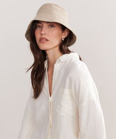 Linen Bucket Hat Natural Inspired by fisherman styles, our elevated take on the classic bucket hat is the summer’s definitive beach bag essential. 100% linen. Made in Portugal. | Jenni Kayne Women's Linen Bucket Hat Size Small/Medium Casual Linen Brimmed Bucket Hat, Chic Natural Bucket Hat, Chic Natural Color Bucket Hat, Chic Natural Sun Hat For Everyday Use, Summer Panama Hat With Curved Brim For Everyday, Chic Natural Sun Hat For Everyday, Chic Natural Color Sun Hat For Everyday Use, Chic Natural Color Sun Hat For Everyday, Casual Everyday Linen Hat