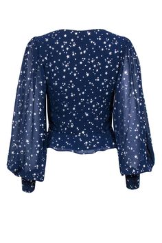 You'll be seeing stars in this flashy Yumi Kim blouse! Made with a sparkly star print and adorable peplum hem, this posh patriotic piece is perfect for a Fourth of July or Memorial day soiree! Style with white shorts and a bold red lip and you'll be all set for fireworks and hotdogs. Size S 100% Polyester Concealed side zipper Lined body Fitted silhouette V-neckline Long sleeve Star print design Faux buttons on front Peplum hem Bust 35" Waist 27" Sleeve length 28" Shoulder to hem 19.5" Fitted Star Print Tops For A Night Out, Fitted Star Print Top For Night Out, Fitted Star Print Tops For Fall, Fitted Long Sleeve Tops With Star Print, Fitted Tops With Star Print For Fall, Summer Tops With Star Print For Night Out, Star Print Tops For Night Out In Spring, Fitted Blue Top With Star Print, Spring Party Tops With Star Print