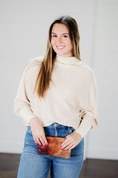 Oversized turtleneck top sweater -unlined -lightweight -Fabric content - 50% cotton, 50% modal -Machine wash cold / Tumble dry low -Colors may vary from different viewing devices.