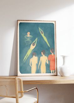 a painting is hanging on the wall above a desk with a chair and vase in front of it