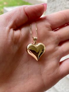 14k beautiful gold puffed heart love pendant. Material: Genuine 14k solid gold. Length: From top the bail to the bottom of the heart is approximately 1 inch long. Width: Approximately .80 inches wide. Weight: approximately 2.1 grams. *Chain sold separately* chains purchased with this order is approximately 1.5 grams* Comes in a nice box. 14k Heart Pendant Necklace For Valentine's Day, 14k Gold Heart Pendant Necklace For Anniversary, 14k Stamped Heart Pendant Necklace For Valentine's Day, 14k Gold Polished Heart Pendant Necklace, Gold Heart Pendant Necklace With Polished Finish, 14k Gold Heart Necklace With Charms, 14k Gold Pendant Heart Necklace With Polished Finish, 14k Gold Polished Finish Heart Necklace, 14k Gold Heart Necklace With Polished Finish