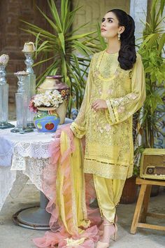 Festive Yellow Embroidered Dress, Party Wear Dresses In Chinon, Yellow Semi-stitched Dress With Intricate Embroidery, Yellow Chinon Dupatta With Intricate Embroidery, Festive Yellow Embroidered Dress With Resham Embroidery, Festive Yellow Dress With Resham Embroidery, Festive Yellow Resham Embroidered Dress, Festive Yellow Dress With Intricate Embroidery, Yellow Wedding Dress With Intricate Embroidery