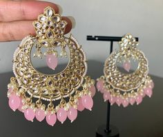 Light Pink Kundan Polki Chandbali Earrings. Stylish Fancy Party Wear Jhumka Earrings .   Height: 3.5 inch Width: 2 inch These Jhumka Ear Rings can be worn with all kind of traditional Outfits.These beautiful Earrings are handcrafted in brass alloy with pearl stones of very fine quality. Ideal Gift for Wife, Girls, Women, Girlfriend.Ethnic Wear. Can be worn for engagement and wedding parties.  Handcrafted pair of earrings. Gives traditional look. Indulge in it or gift it and watch the compliments Pink Chandbali Earrings, Pink Earrings Indian, Pink Indian Dress, Pink Jhumka, Polki Chandbali, Light Pink Earrings, Kundan Chandbali, Kundan Jhumka, Desi Jewelry