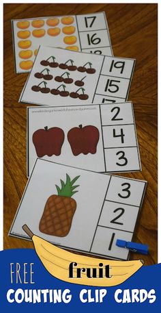 three fruit counting clip cards on a table