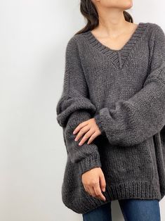 "Oversized casual v-neck pullover sweater give you super warm and stylish looking! Features: * oversized looking * drop-shoulder sleeves * 70% mohair/ 30% acrylic mixed blended color yarn - soft and comfy. Size: S/M (us 2-8) L/XL(us 10-16). Measurements: Size S/M: Chest - 51\"(130cm) Length - 28\" (75cm) Size L/XL: Chest - 55\"(140cm) Length - 30\" (80cm) Pls. see options for different colors. If you want it in different measurements, pls. leave the note or convo me. Hand wash in cold water and Knitted Acrylic V-neck Sweater, Soft Knit V-neck Acrylic Sweater, Soft Knit Acrylic V-neck Sweater, V-neck Soft Knit Acrylic Sweater, Acrylic V-neck Soft Knit Sweater, Cozy Mohair V-neck Sweater, Oversized Gray V-neck Sweater, Oversized Knitted V-neck Sweater, Gray Chunky Knit V-neck Sweater