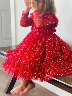 Hi everyone, Good News: All sizes are in stock and go same day.  SAME DAY SHIPPING Welcome to my store.  Brand new, handmade and high quality! Color: Red Base + Golden Stars Style: Dress - Kidswear Material: Tulle  Please select Dress + Unicorn for having both.  Or just a dress? No worries. It is still magical with the red and gold energy! Definitely she will be happy. ♥ (Since this is a handmade product, measurements might be slightly different.) Please feel free to contact me for any question. Long Sleeve Winter Princess Dress For Birthday, Winter Long Sleeve Princess Dress For Birthday, Winter Birthday Princess Dress With Long Sleeves, Winter Long Sleeve Birthday Princess Dress, Red Princess Dress For Christmas Dress-up, Long Sleeve Winter Dress For Birthday, Winter Long Sleeve Birthday Dresses, Christmas Celebration Dress With Long Sleeves, Long Sleeve Winter Dresses For Birthday