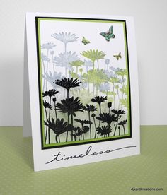 a card with flowers and butterflies on it