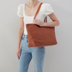 Designed for everyday living, this tote bag has a top zip closure and leather double straps. Bolder Tote in Wave Weave Leather  Wheat TOTE Bag in Wheat | Hobo® Made By Mary, Common Thread, Sweater Jumpsuit, Antique Brass Hardware, Sterling Necklaces, Woven Design, Sweater Skirt, Leather Tote Bag, Shoe Sale