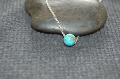 single turquoise bead necklace, sterling silver dainty necklace, tiny gemstone necklace Tiny turquoise bead necklace. Materials: - natural blue turquoise bead - 8 mm . - sterling silver delicate chain - silver components - because I use natural materials, they bead may vary in shape, size and color. Gift boxed. Link to my shop https://www.etsy.com/shop/SilverIrisJewelry?ref=hdr *INTERNATIONAL VAT TAXES & CUSTOMS FEE'S may be charged by your country's customs and/or postal system in order for Sterling Silver Turquoise Gemstone Beads Necklace As Gift, Gift Turquoise Gemstone Beads Necklace In Sterling Silver, Gift Turquoise Sterling Silver Necklace With Gemstone Beads, Minimalist Single Strand Blue Jewelry, Minimalist Blue Single Strand Jewelry, Turquoise Sterling Silver Jewelry With Delicate Chain, Dainty Blue Turquoise Necklace In Sterling Silver, Minimalist Adjustable Turquoise Necklace, Dainty Blue Sterling Silver Turquoise Necklace