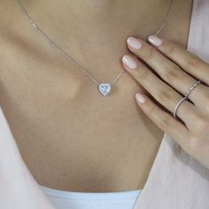 Luxury Elegant Heart Cut Solitaire Necklace, Luxury Heart Cut Diamond Solitaire Necklace, Dainty Diamond Necklace With Heart Charm, Luxury Heart Cut Solitaire Necklace, Luxury Pave Setting Diamond Necklace With Round Pendant, Classic Heart-shaped Birthstone Necklace, Classic Heart Pendant Necklace With Birthstone, Brilliant Cut Necklace For Valentine's Day Gift, Silver Heart Cut Birthstone Necklace