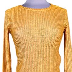 Beautiful Weave Of Gold Polyester And Elastane Creates This Simple, Elegant Cropped Sweater/Top By Zara. Size S Measurements Laying Flat: Pit To Pit = 16” Shoulder Top To Hem Bottom = 17” Sleeves = 23” Condition: New, Never Worn, Original Tag Holder In Place, But Tags Not. Always - Automatic 25% Off For Purchasing 3 Or More Items!! Gold Stretch Long Sleeve Tops, Fitted Gold Sweater For Spring, Zara Stretch Long Sleeve Knit Top, Zara Stretch Knit Top With Long Sleeves, Zara Fitted Long Sleeve Knit Top, Gold Stretch Blouse For Fall, Zara Gold Tops For Spring, Zara Textured Knit Stretch Tops, Zara Stretch Pointelle Knit Tops