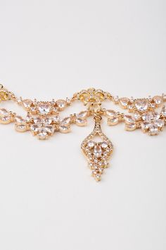 Elegant Rhinestone Necklace With Clavicle Chain, Vintage Rose Gold Jewelry For Evening, Elegant Gold Crystal Rhinestone Necklace, Elegant Gold Rhinestone Necklace For Formal Occasions, Rose Gold Vintage Jewelry For Evening, Gold Dangle Bridal Necklace For Party, Elegant Jeweled Gold-plated Necklaces, Elegant Jeweled Gold Plated Necklaces, Feminine Crystal Jewelry For Parties