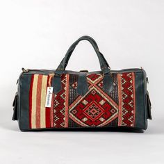 Artihandmade™ Leather Bag Are you looking for a fashion and trendy travel bag, for travelers who apreciate craftsmanship and handmade design. This kilim bag is a Must-Have for your outgoing trips due to the creative kilim patterns and high quality materials. We offer you a unique and light bag with real leather hand-dyed tanned you will certainly be in harmony with the cool and natural look. Easy to carry for Clothing-Traveling and Sports , With Two Side Pockets And Two In Interior For Accessori