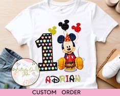 a mickey mouse birthday shirt with the number one on it