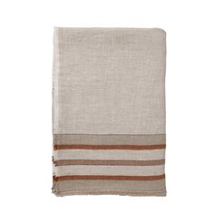 a beige and brown striped towel on a white background with an orange stripe in the middle