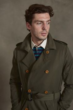 A classic fit defined by modernity, Earl features a double breasted front with wide lapels and belted waist with plenty of vintage details. Functional as it is stylish, our version of this iconic classic comes in a polyester cotton blend that keeps you warm and dry throughout any occasion. | mens trenchcoats | coats jackets | fashion coat | fall outerwear | coat men | fall fashion outfits Classic Khaki Outerwear With Double-breasted Button, Classic Khaki Double-breasted Outerwear, Khaki Pea Coat With Double Button Closure, Solid Double-breasted Gabardine Pea Coat, Classic Double-breasted Outerwear With Belted Cuffs, Classic Gabardine Pea Coat, Classic Khaki Pea Coat With Double Button Closure, Classic Khaki Pea Coat With Lapel Collar, Classic Khaki Outerwear With Belted Cuffs