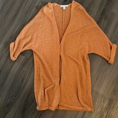 Orange Cardigan, Sleeves Come Down To The Elbow, Forever21, Size Medium, Never Worn But There Is A Small Hole From The Hanger. Brown V-neck Summer Cardigan, Brown Spring Cardigan For Loungewear, Brown Cardigan For Spring Loungewear, Trendy Open Front Cardigan For Loungewear, Trendy Open Front Sweater For Loungewear, Trendy V-neck Cardigan One Size, Trendy Open Front Knit Top, Trendy V-neck One Size Cardigan, Trendy V-neck One-size Cardigan