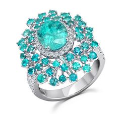 High End Jewelry - Diamond and Paraiba Tourmaline couture ring by award winning fine jewelry designer Graziela. Exclusive fine jewelry design available at Ethos of London - Contemporary Fine Jewelry Neon Blue Color, Argentium Silver Jewelry, Contemporary Fine Jewelry, Paraiba Tourmaline, Tourmaline Jewelry, Jewelry Designers, Argentium Silver, Fine Jewelry Designers, Jewelry Designer