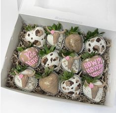 a box filled with chocolate covered strawberries